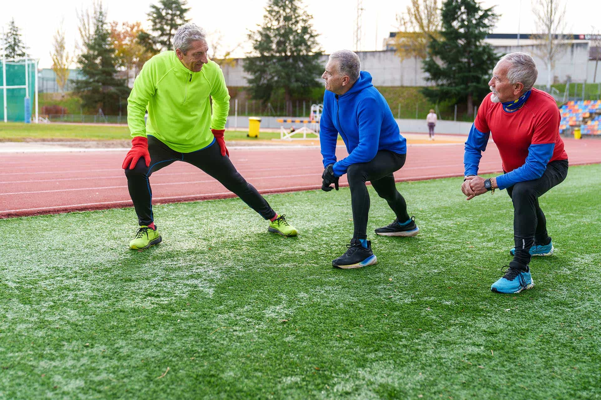 elderly-athletes-doing-side-stretches-on-running-t-2025-03-08-18-18-40-utc-min